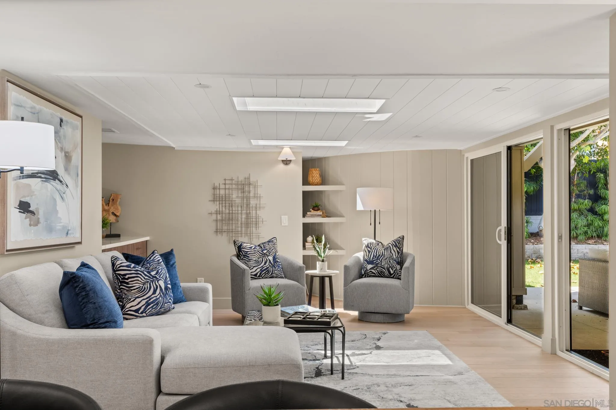 896 La Jolla Rancho Road La Jolla, CA 92037 - Photo 41 of 54 a living room with furniture and a large window