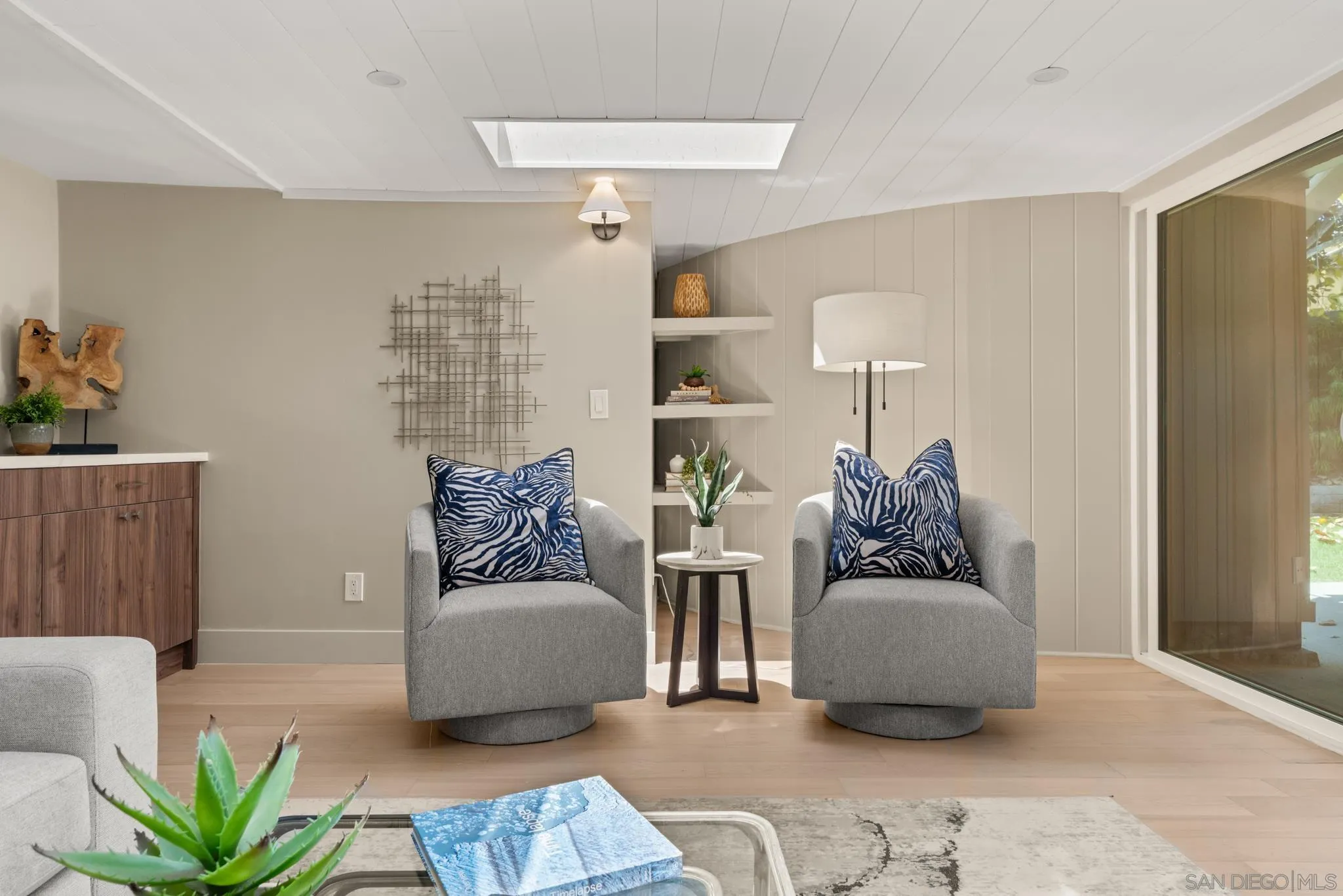 896 La Jolla Rancho Road La Jolla, CA 92037 - Photo 45 of 54 a living room with furniture and a couch