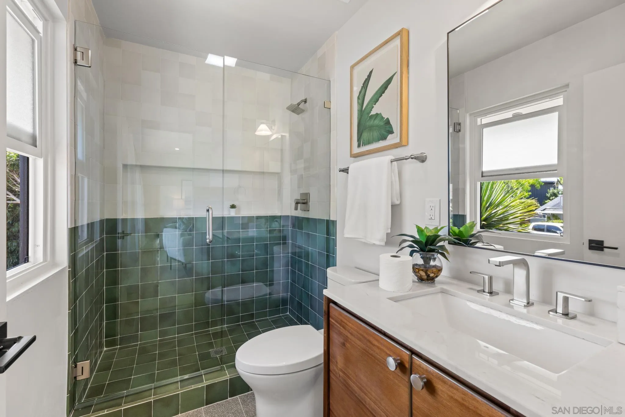 896 La Jolla Rancho Road La Jolla, CA 92037 - Photo 47 of 54 a bathroom with a sink a toilet and shower