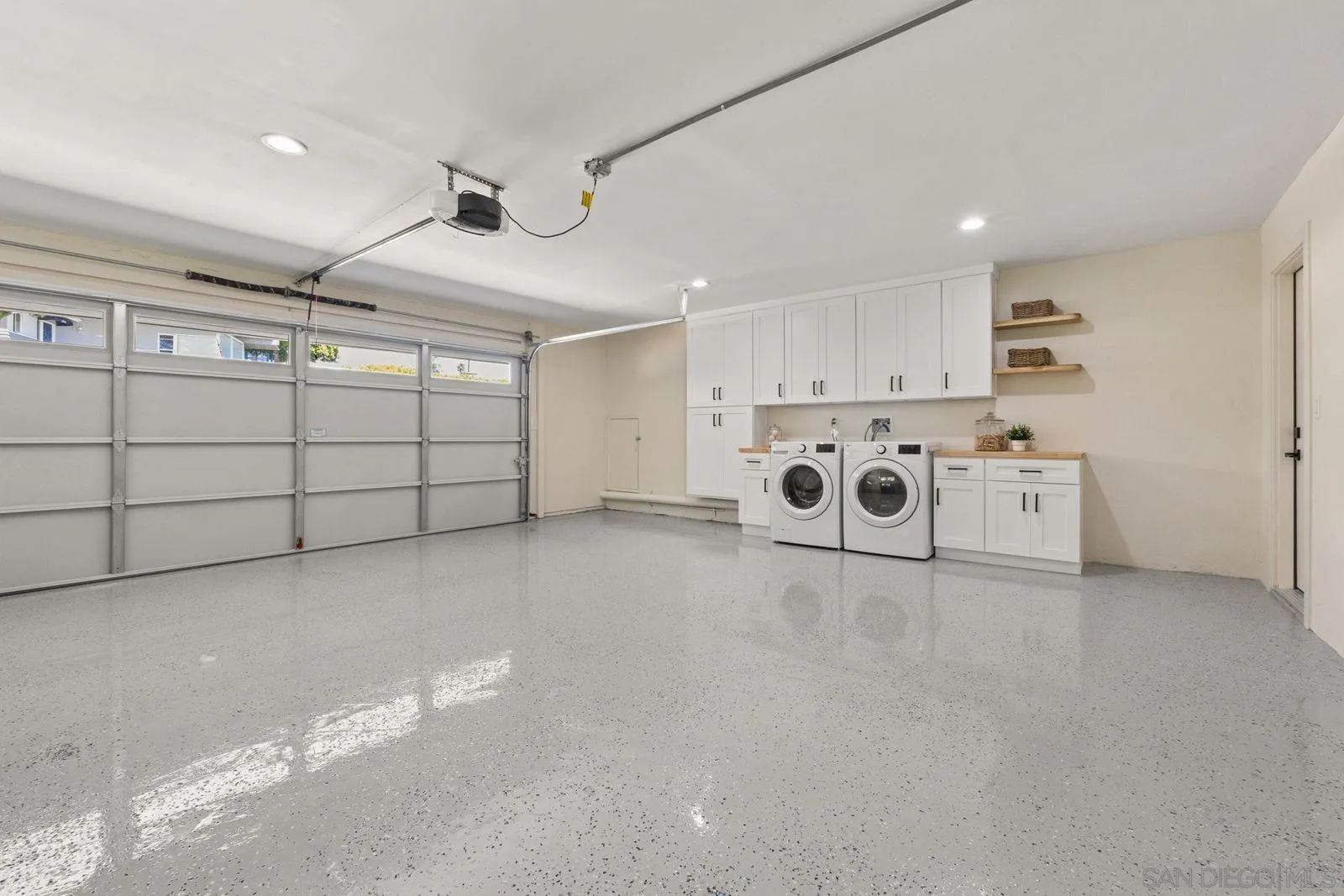 896 La Jolla Rancho Road La Jolla, CA 92037 - Photo 54 of 54 a view of a garage with furniture