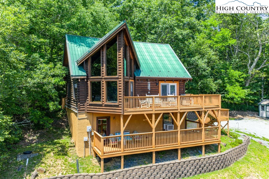 407 Indian Springs Road Boone, NC 28607 - Photo 1 of 40 a view of a house with a deck