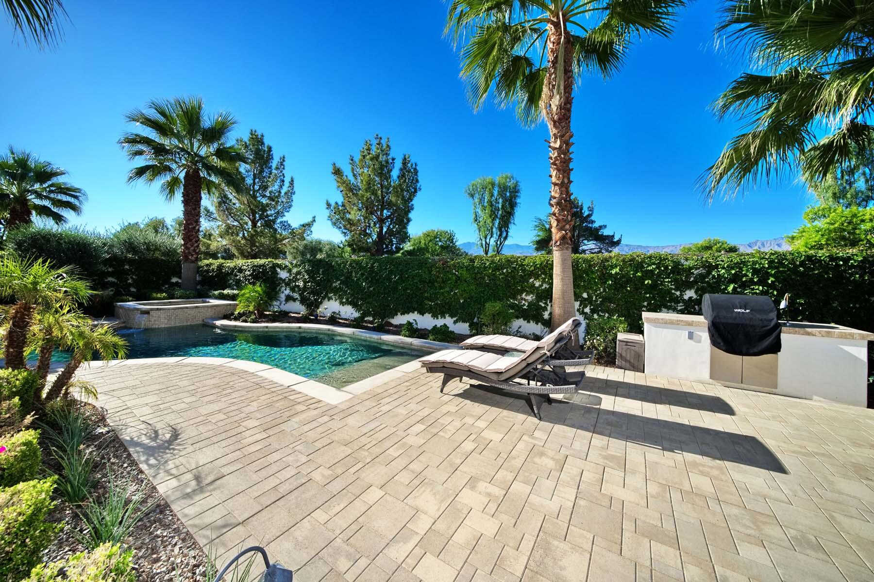 76054 Via Saturnia Indian Wells, CA 92210 - Photo 12 of 61 a view of swimming pool with chairs