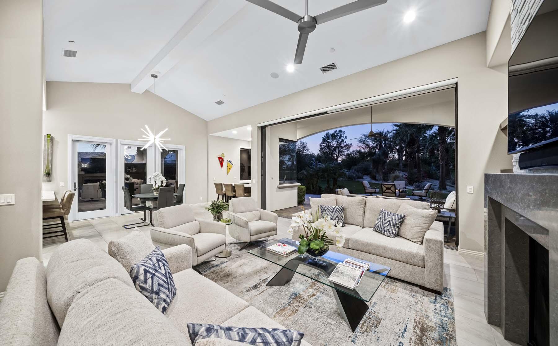 76054 Via Saturnia Indian Wells, CA 92210 - Photo 18 of 61 a living room with furniture and a flat screen tv