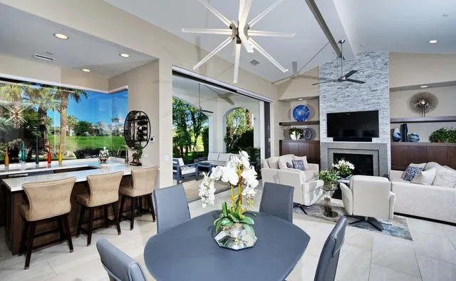 a view of living room and patio