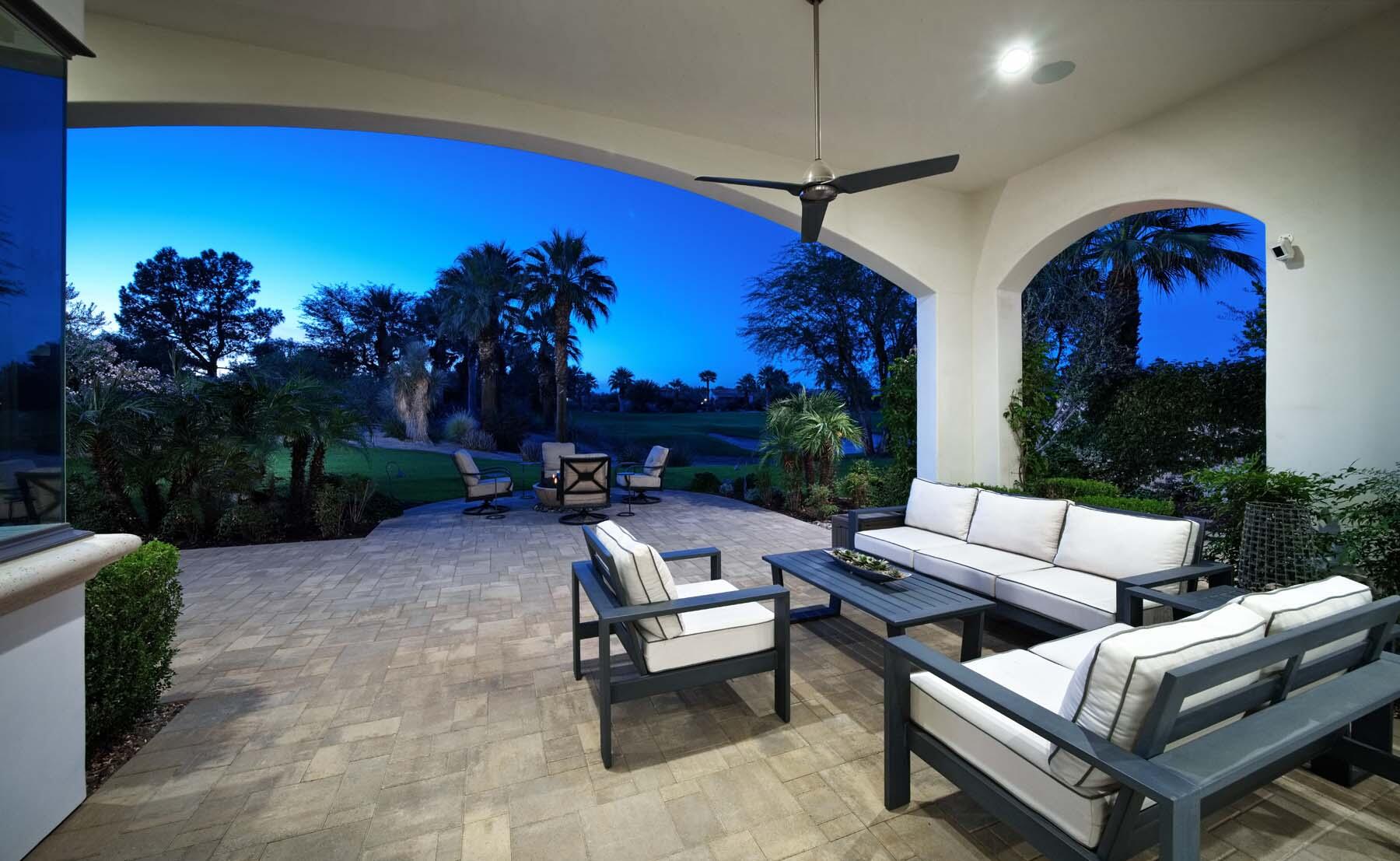 76054 Via Saturnia Indian Wells, CA 92210 - Photo 23 of 61 a outdoor living space with furniture potted plant and a fireplace