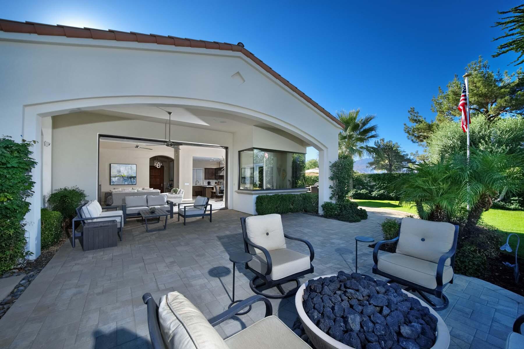 76054 Via Saturnia Indian Wells, CA 92210 - Photo 29 of 61 a view of living room and patio