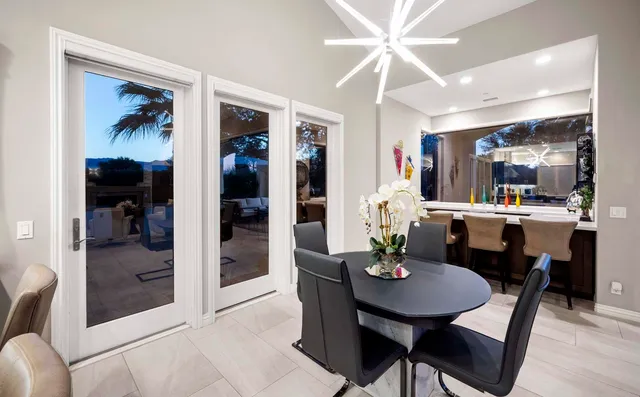 a spacious bathroom with a bathtub sink and mirror