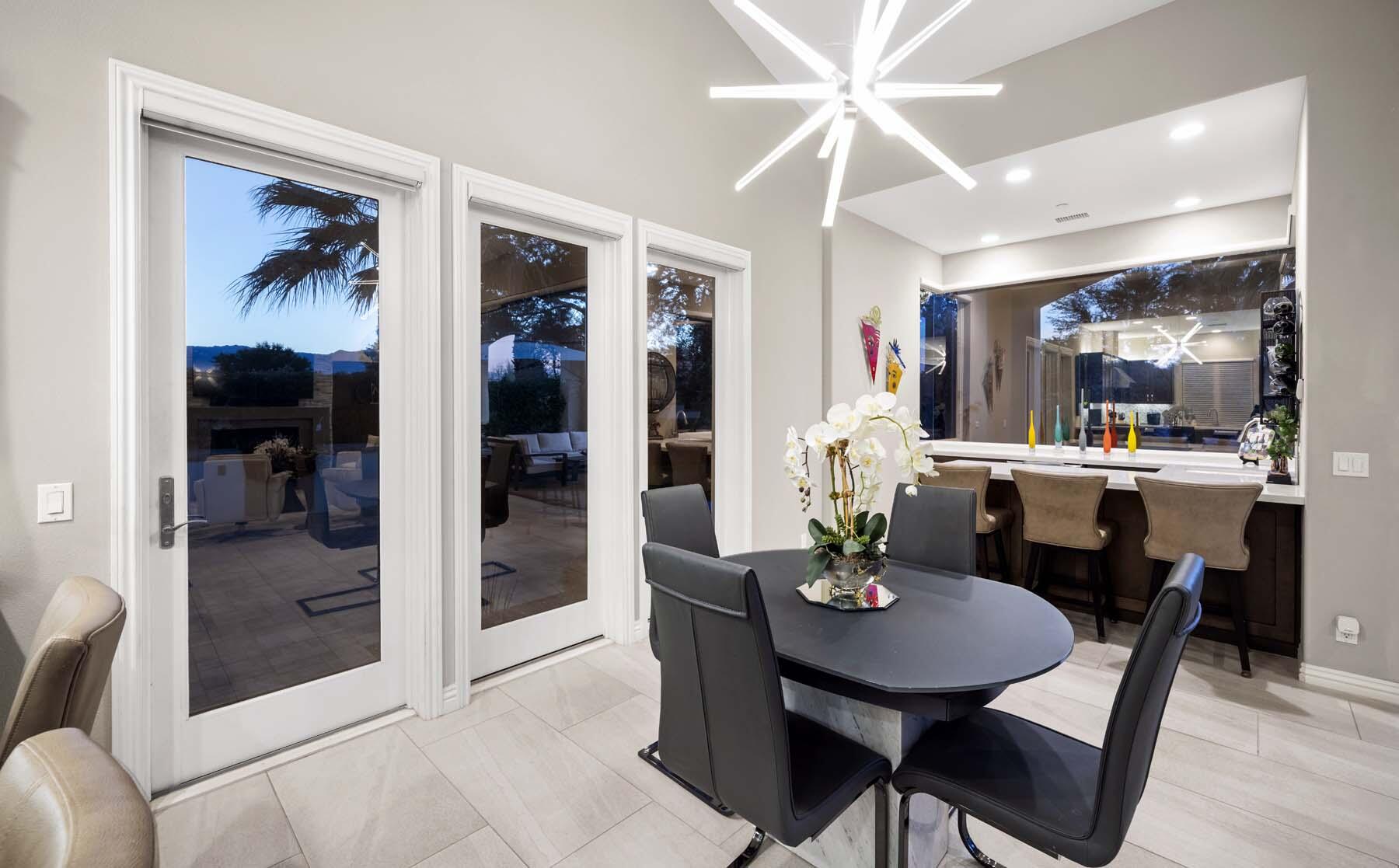 76054 Via Saturnia Indian Wells, CA 92210 - Photo 35 of 61 a dining room with furniture and window