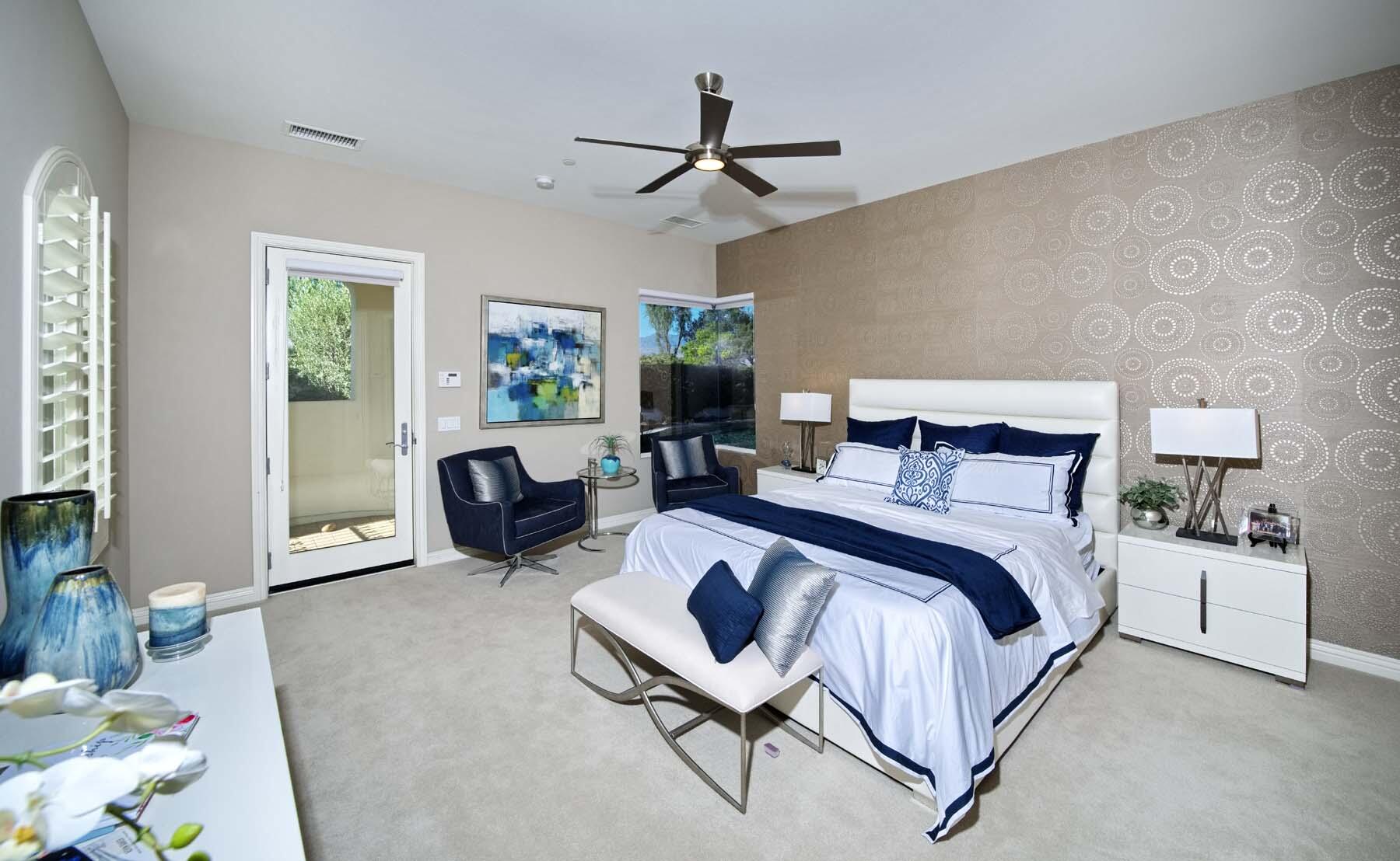 76054 Via Saturnia Indian Wells, CA 92210 - Photo 48 of 61 a bed room with a bed and a couch