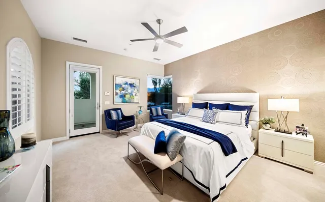 a view of a workspace with a window and couch