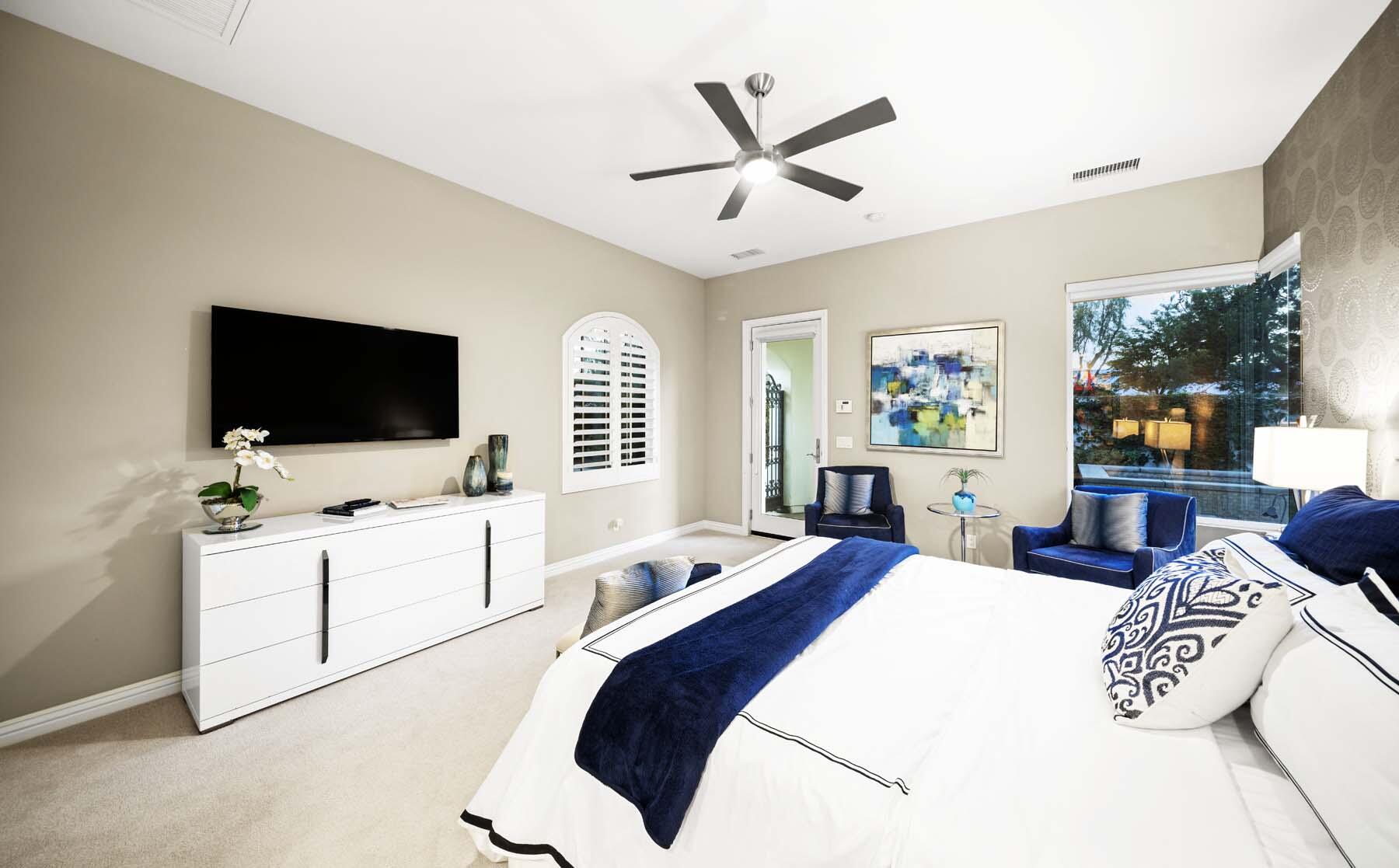 76054 Via Saturnia Indian Wells, CA 92210 - Photo 50 of 61 a living room with furniture and a flat screen tv