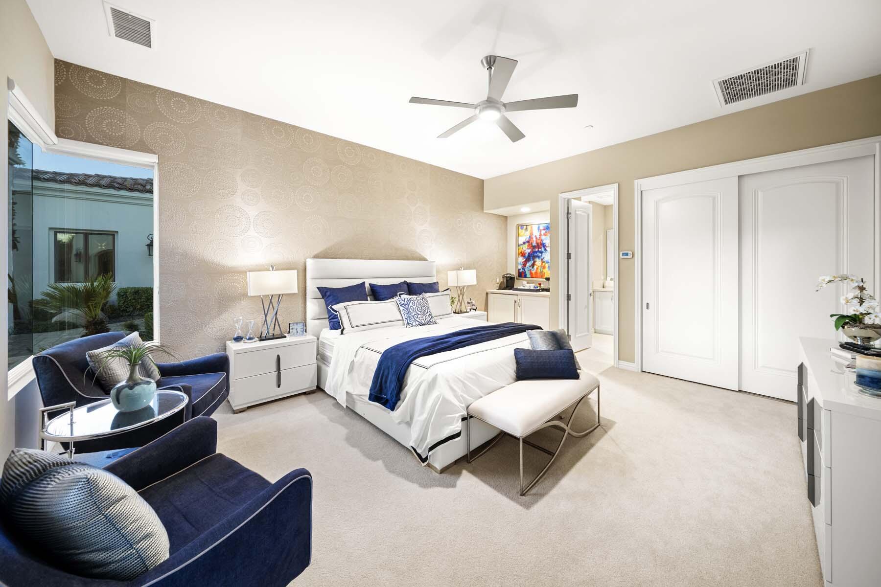 76054 Via Saturnia Indian Wells, CA 92210 - Photo 51 of 61 a bedroom with a bed couch and window