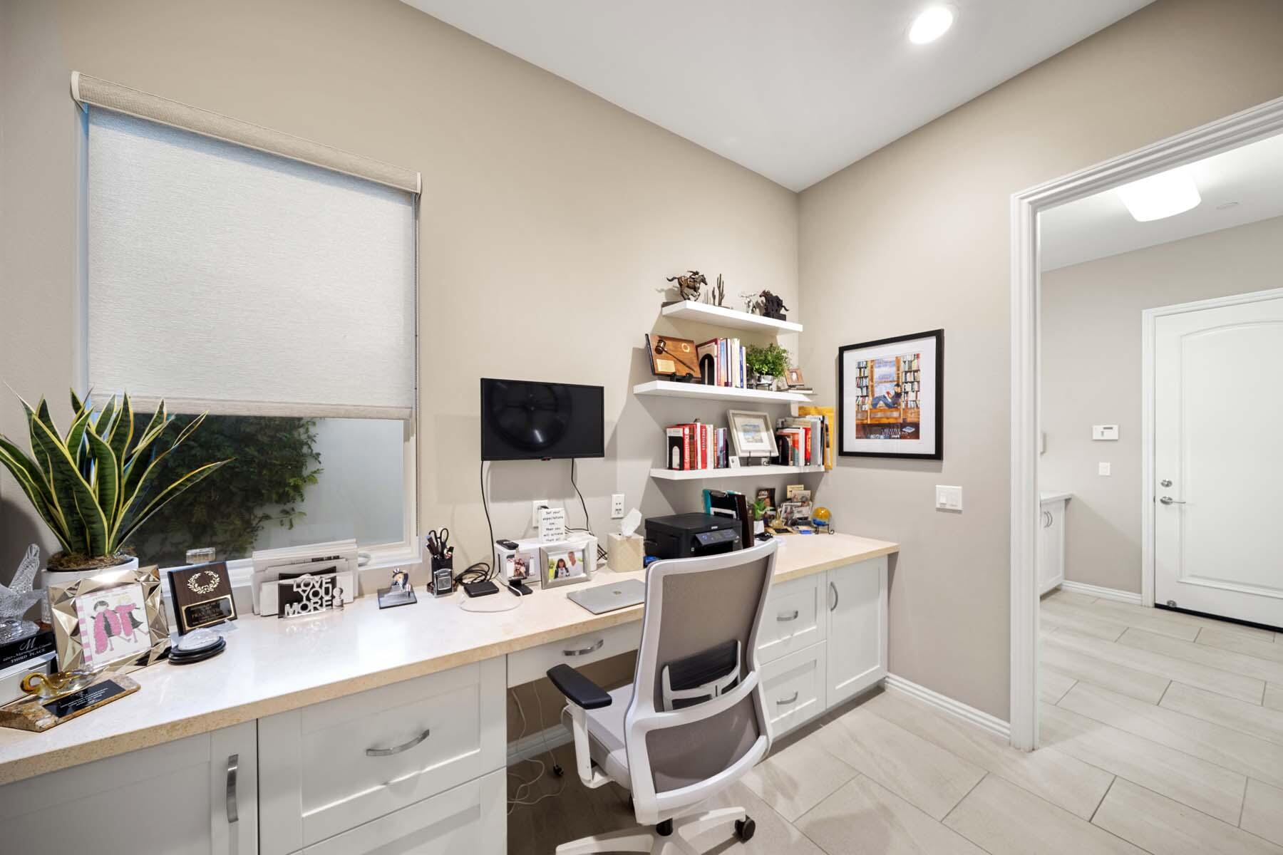 76054 Via Saturnia Indian Wells, CA 92210 - Photo 59 of 61 a view of a workspace with a window and couch