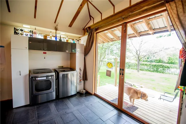a view of a utility room with washer and dryer