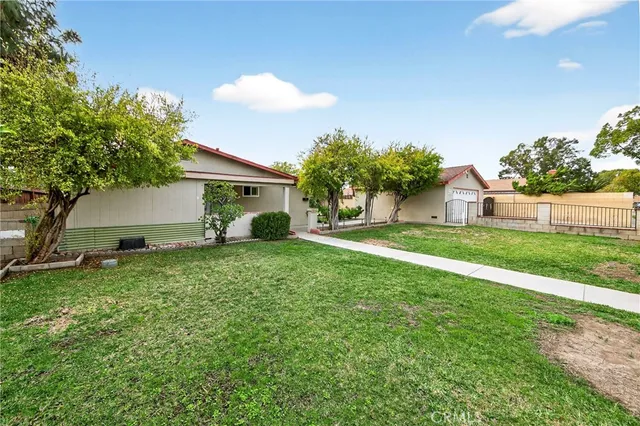 a house view with a garden space