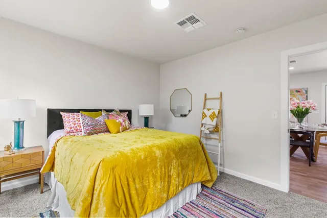 a bathroom with a sink a mirror and toilet
