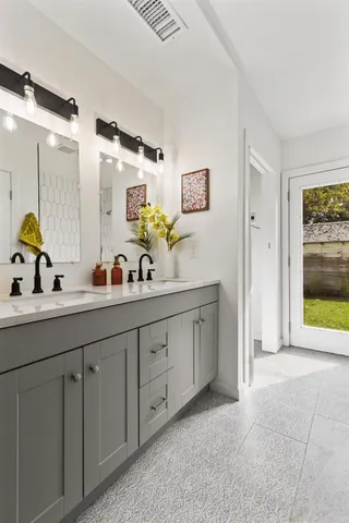 a view of a backyard with wooden fence