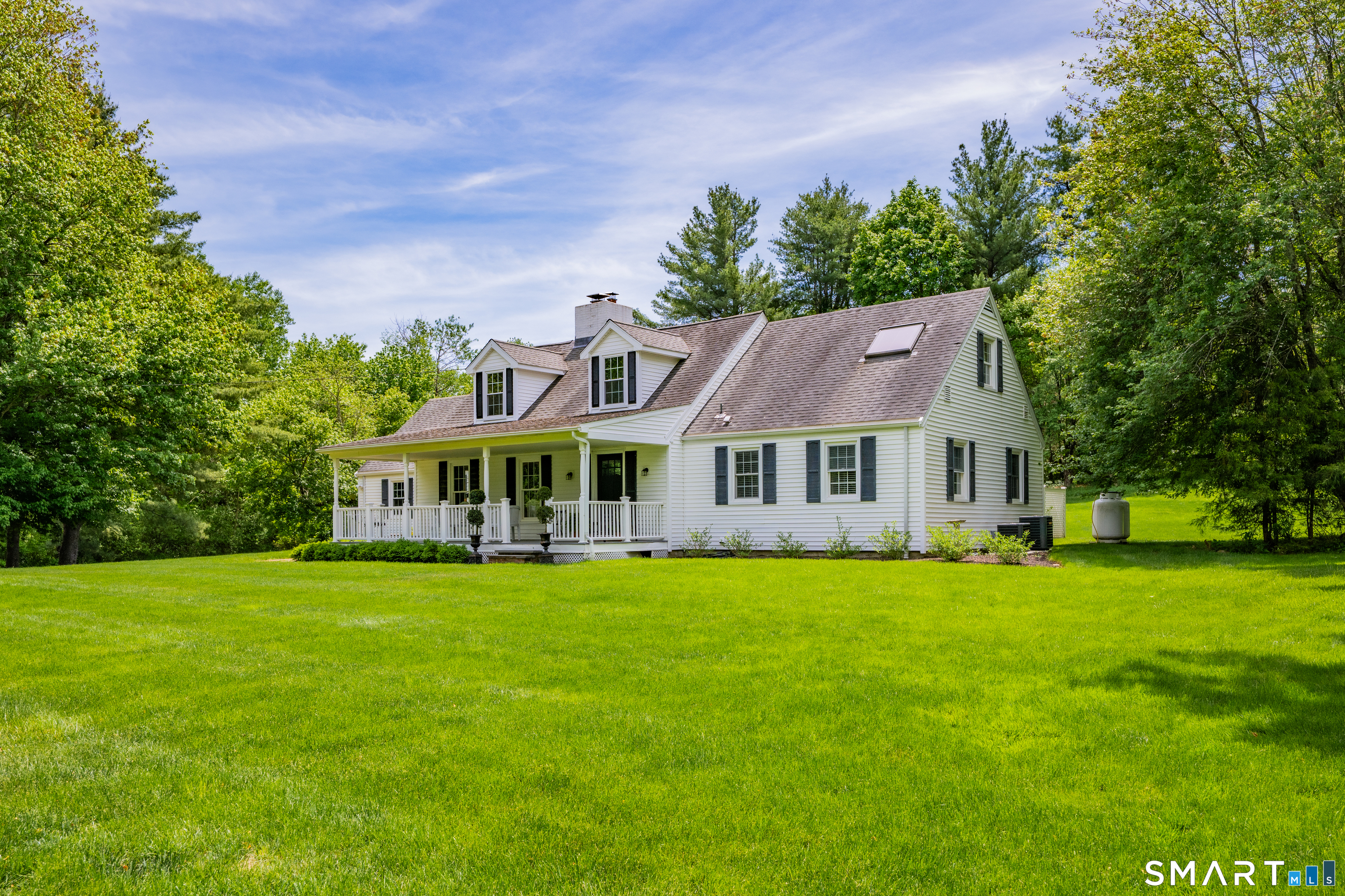 1000 Bassett Road Watertown, CT 06795 - Photo 2 of 35 a view of a house with a big yard