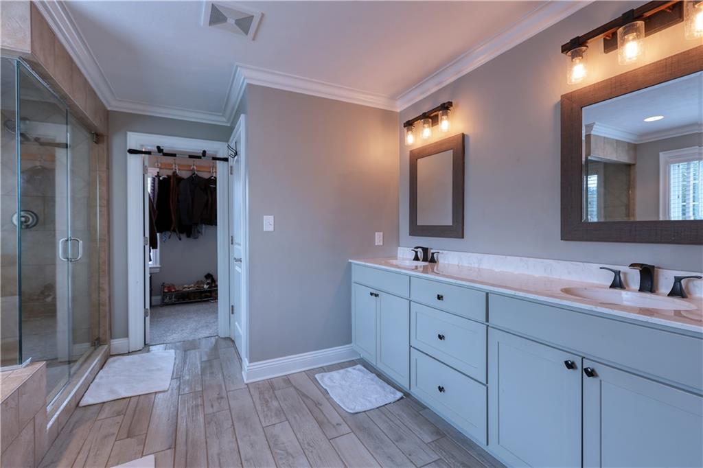 230 Beacom Drive Beaver, PA 15009 - Photo 17 of 25 a spacious bathroom with a double vanity sink and a mirror