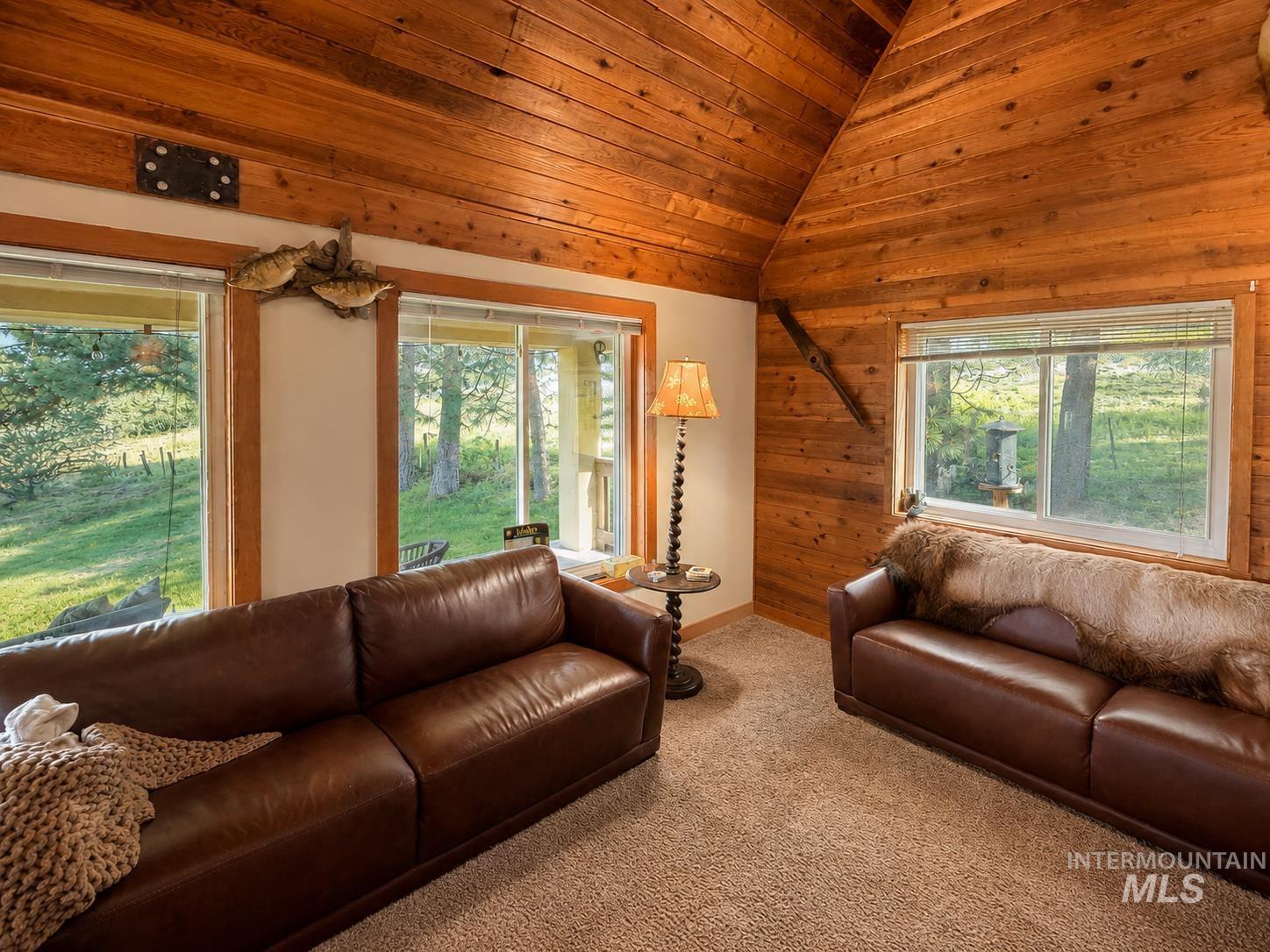 40 Atkin Lane Cascade, ID 83611 - Photo 14 of 46 Expansive green lawn surrounded by mature evergreen trees