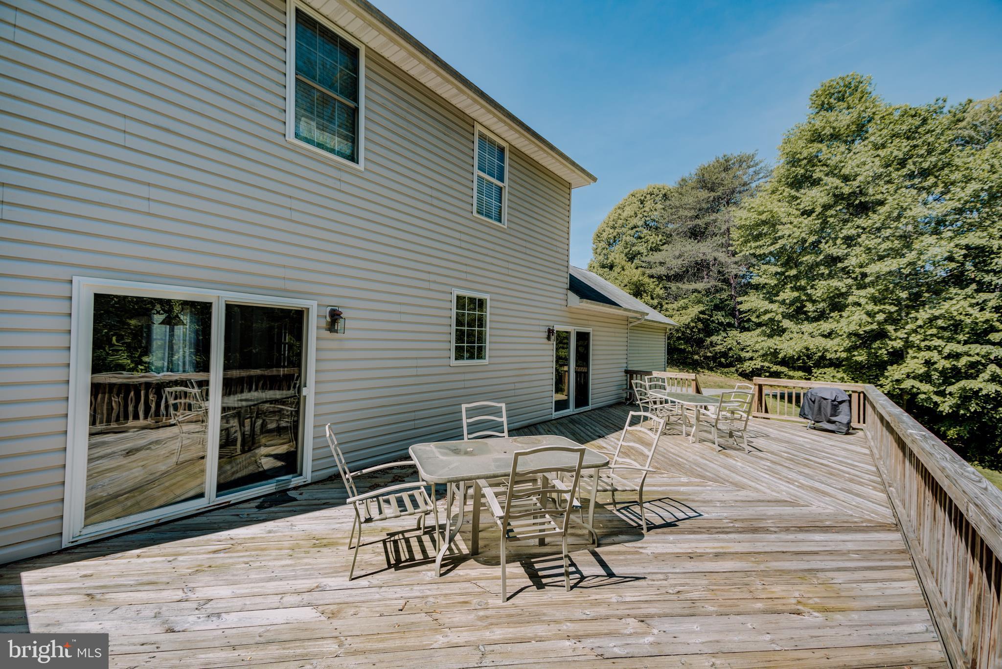 5300 Sheridan Point Road Prince Frederick, MD 20678 - Photo 21 of 50 Large Deck w/Stairs to rear and side yard