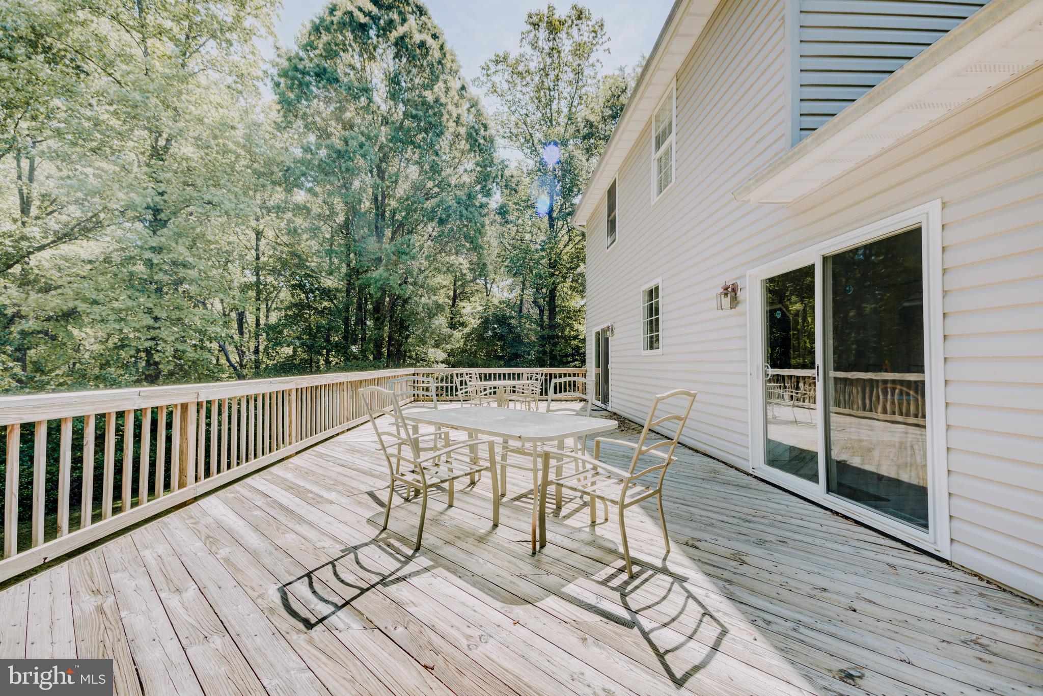 5300 Sheridan Point Road Prince Frederick, MD 20678 - Photo 31 of 50 39 x 16 Deck with 2 sliding glass doors into home