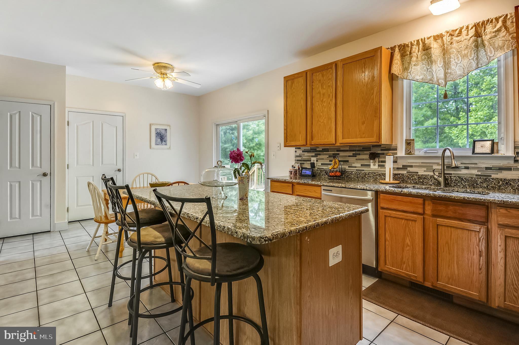 5300 Sheridan Point Road Prince Frederick, MD 20678 - Photo 34 of 50 Granite Counter Tops-Tile Backsplash-Tile Floors
