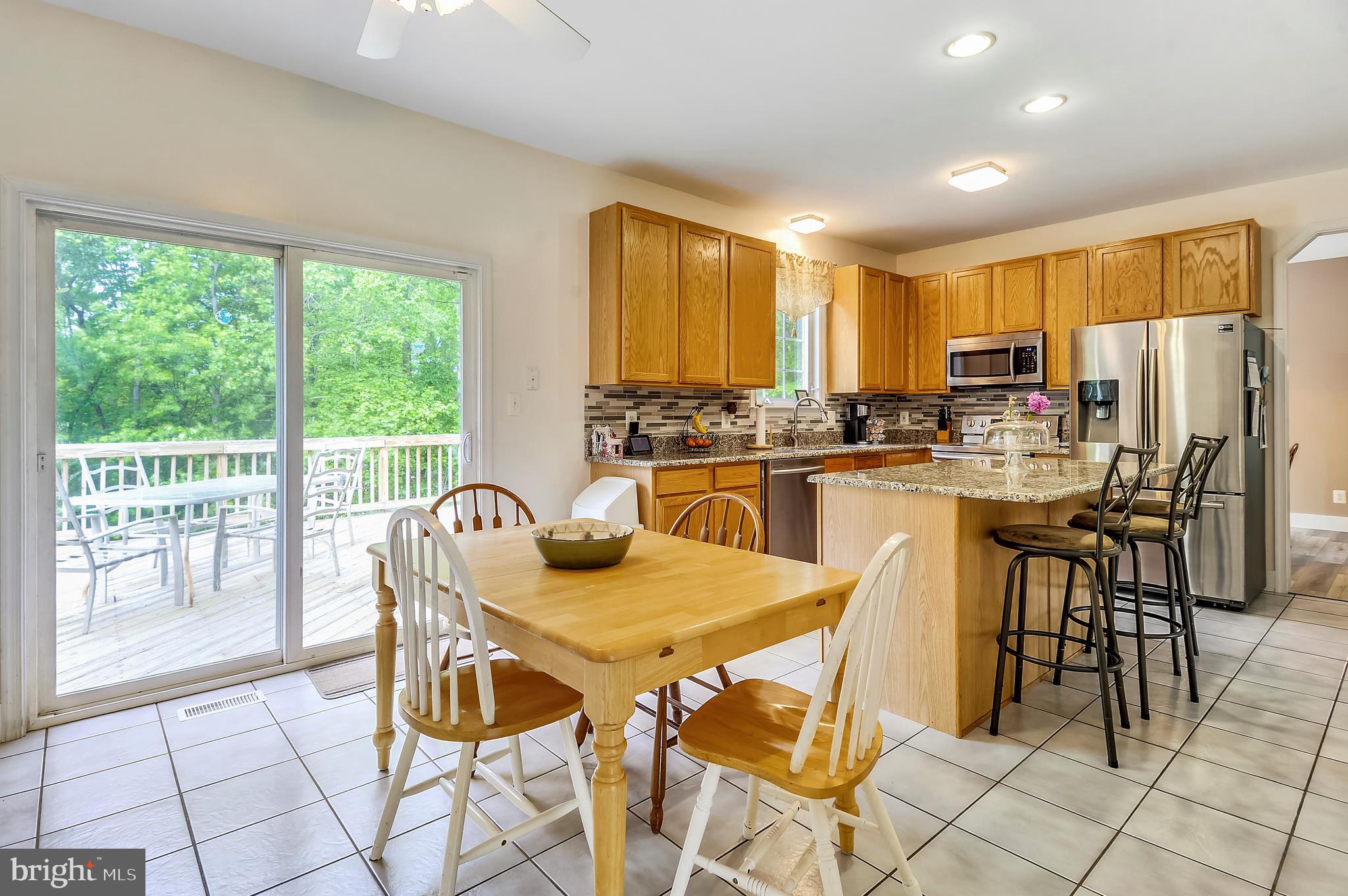 Breakfast Area w/Sliding Glass Door to rear Deck
