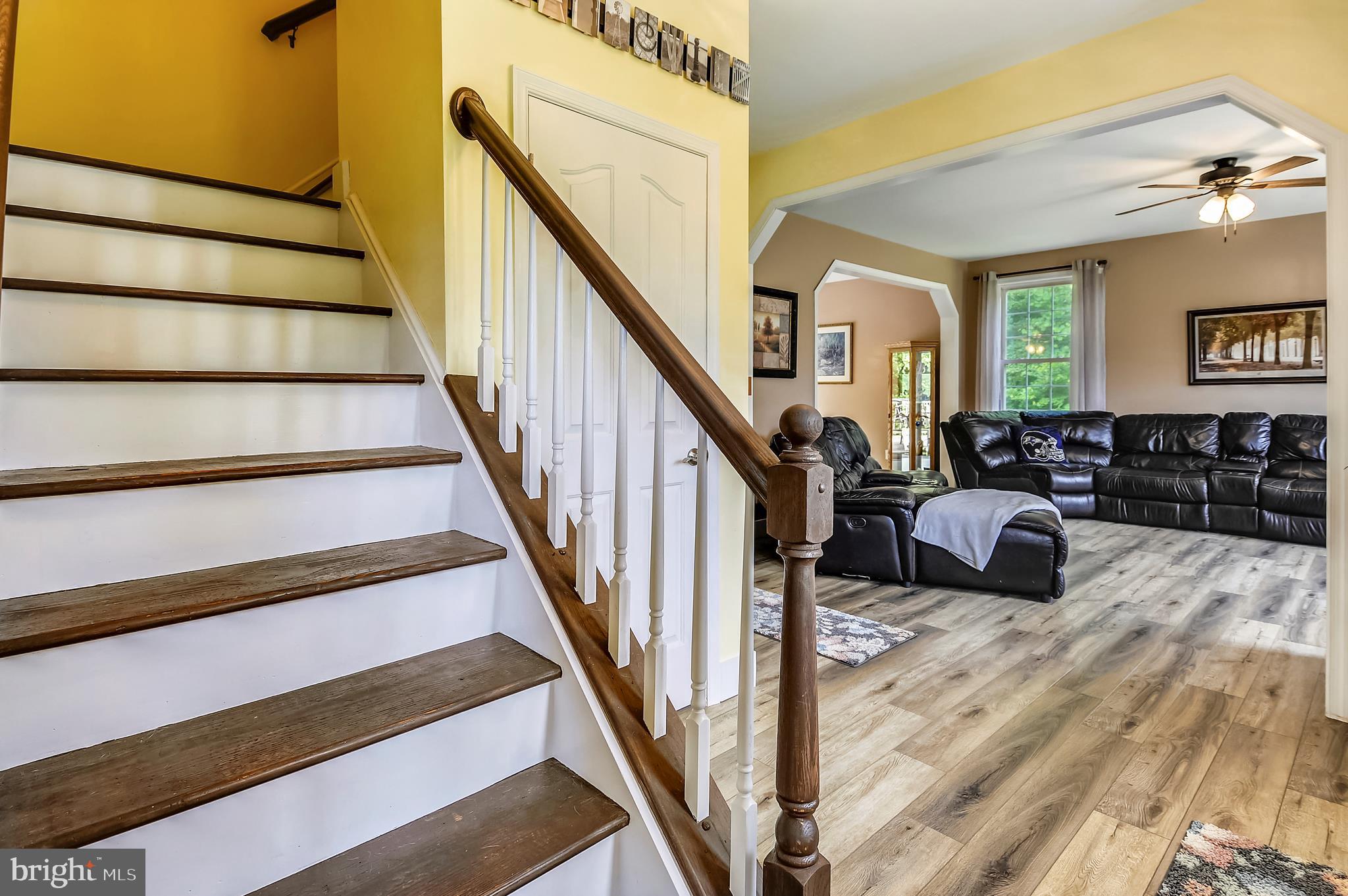 5300 Sheridan Point Road Prince Frederick, MD 20678 - Photo 10 of 50 Foyer/Stairs to Upper Level