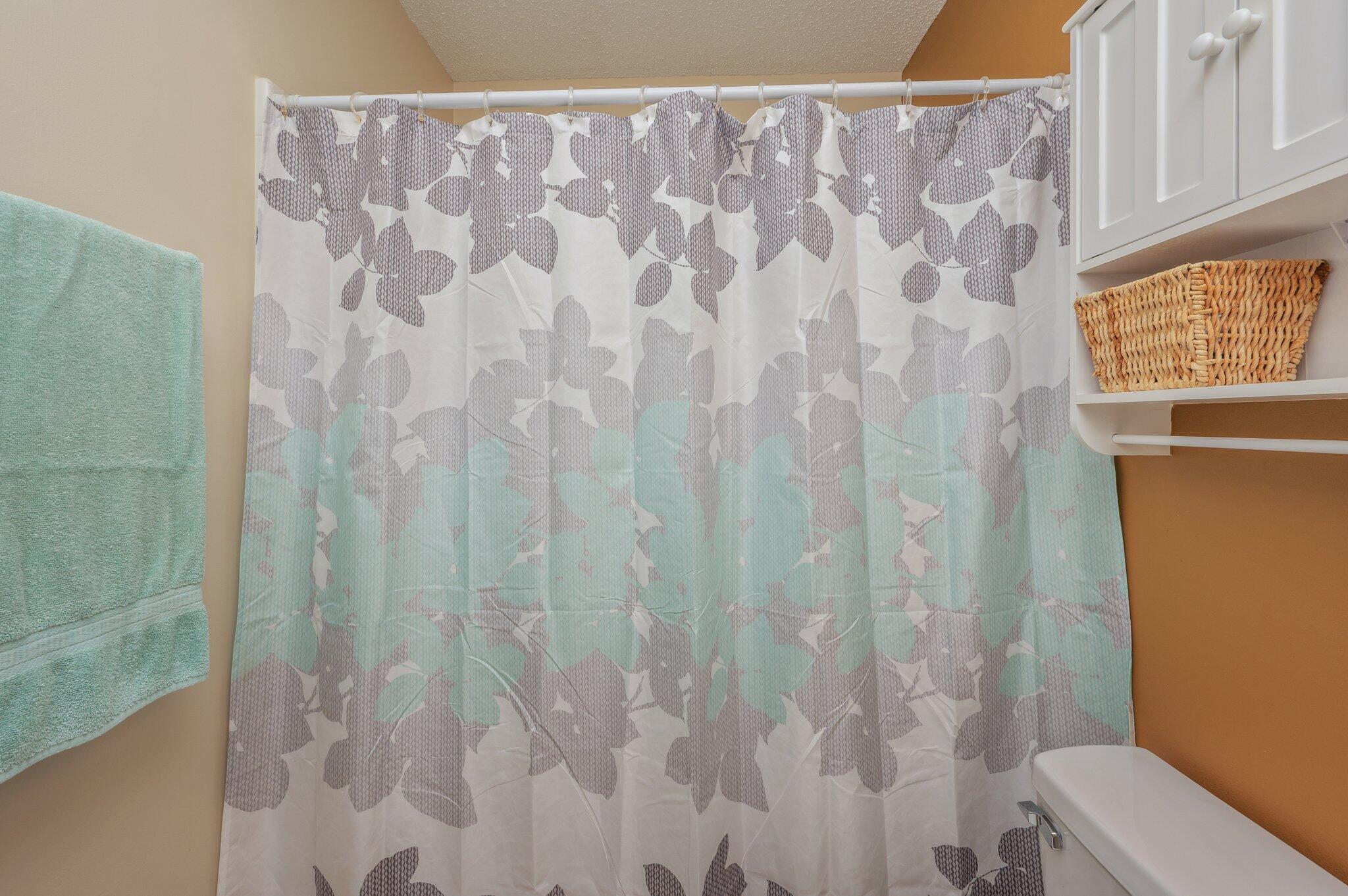 6256 Misty Lane Crestview, FL 32539 - Photo 22 of 39 a bathroom with a window and curtain