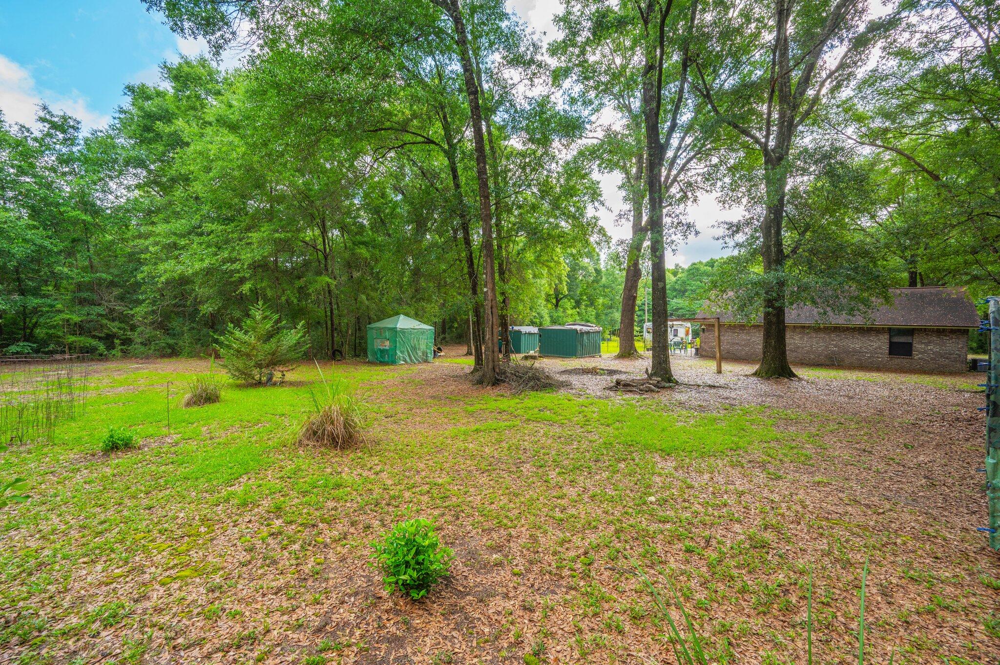 6256 Misty Lane Crestview, FL 32539 - Photo 33 of 39 a view of a park with large trees