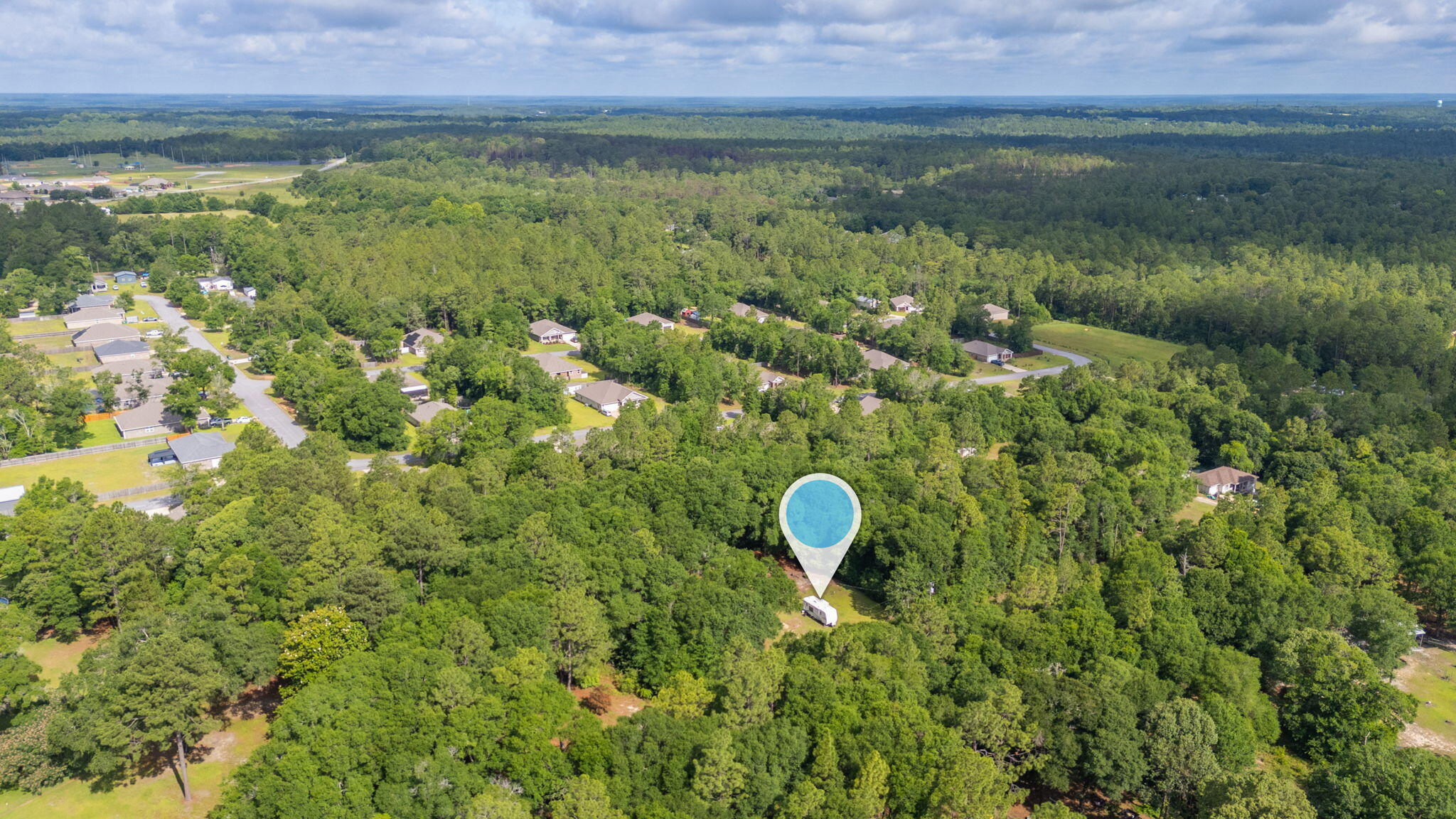 6256 Misty Lane Crestview, FL 32539 - Photo 36 of 39 a view of a lush green forest