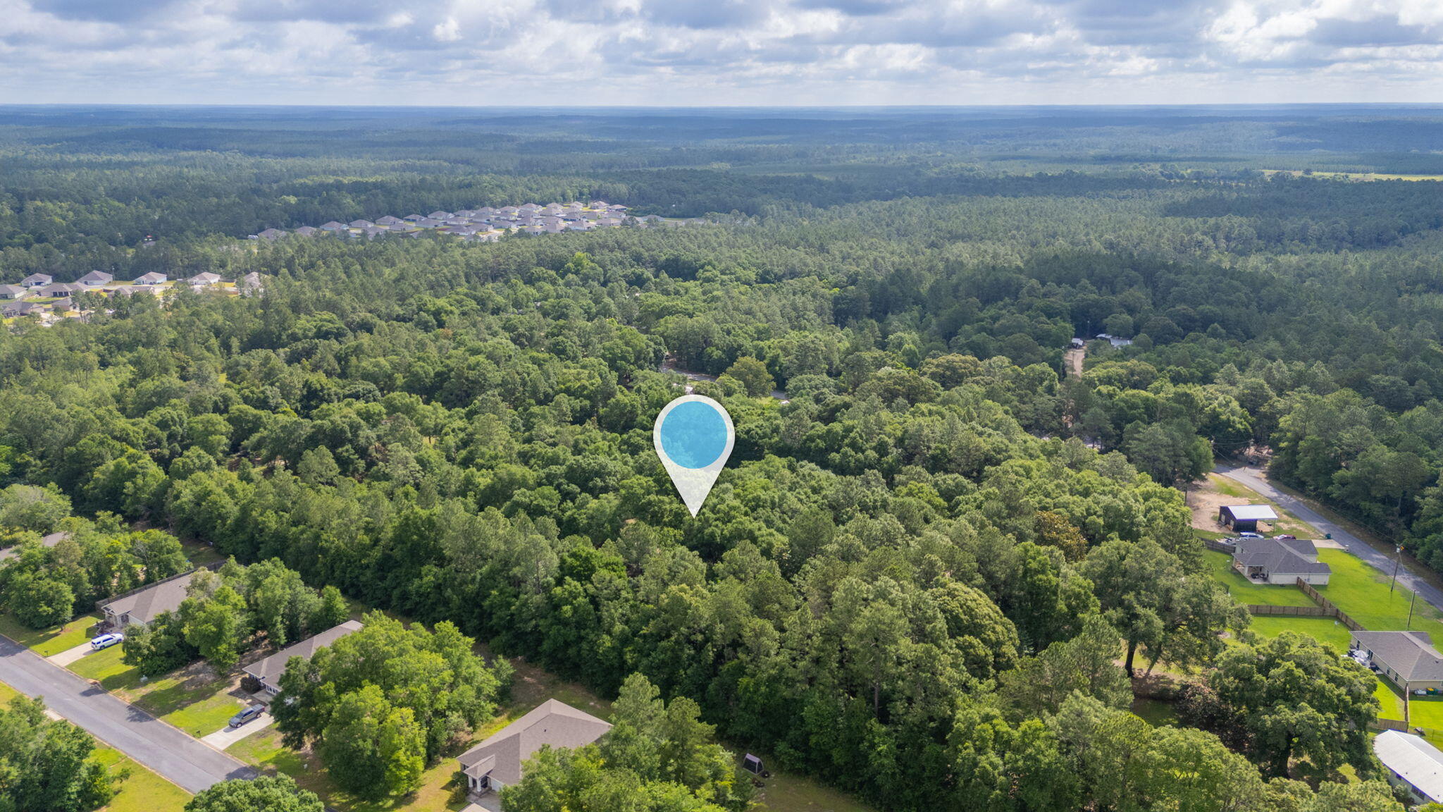 6256 Misty Lane Crestview, FL 32539 - Photo 39 of 39 a aerial view of a house with a yard