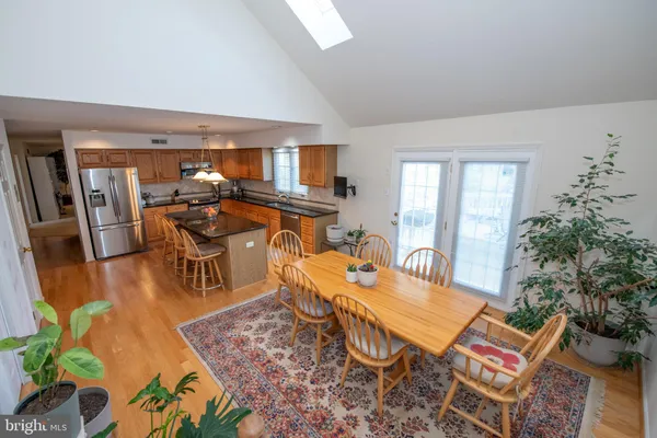 a room with furniture and a potted plant