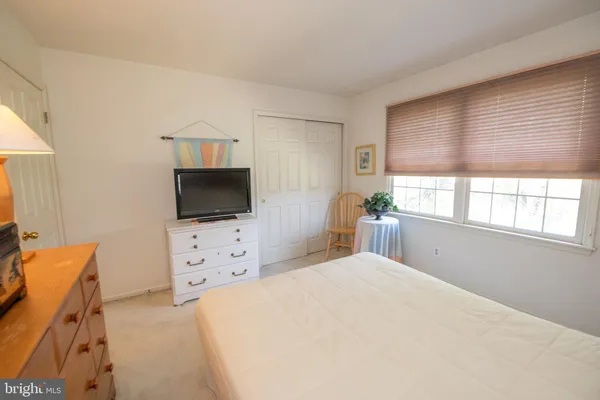 a room with furniture and wooden floor