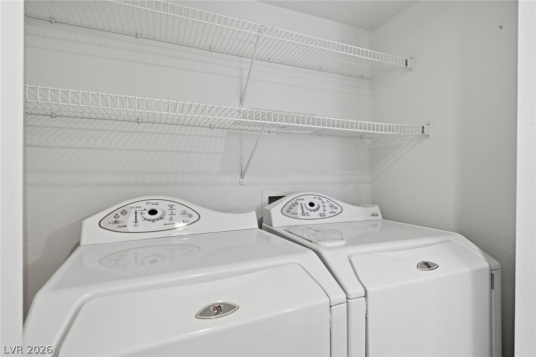 1851 Hillpointe Road, Unit 1311 Henderson, NV 89074 - Photo 25 of 47 Laundry area with washer and dryer