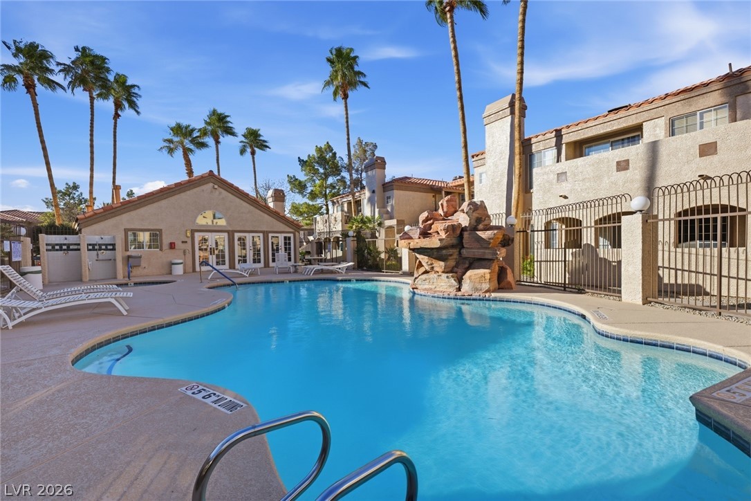 1851 Hillpointe Road, Unit 1311 Henderson, NV 89074 - Photo 37 of 47 Community pool with a patio area