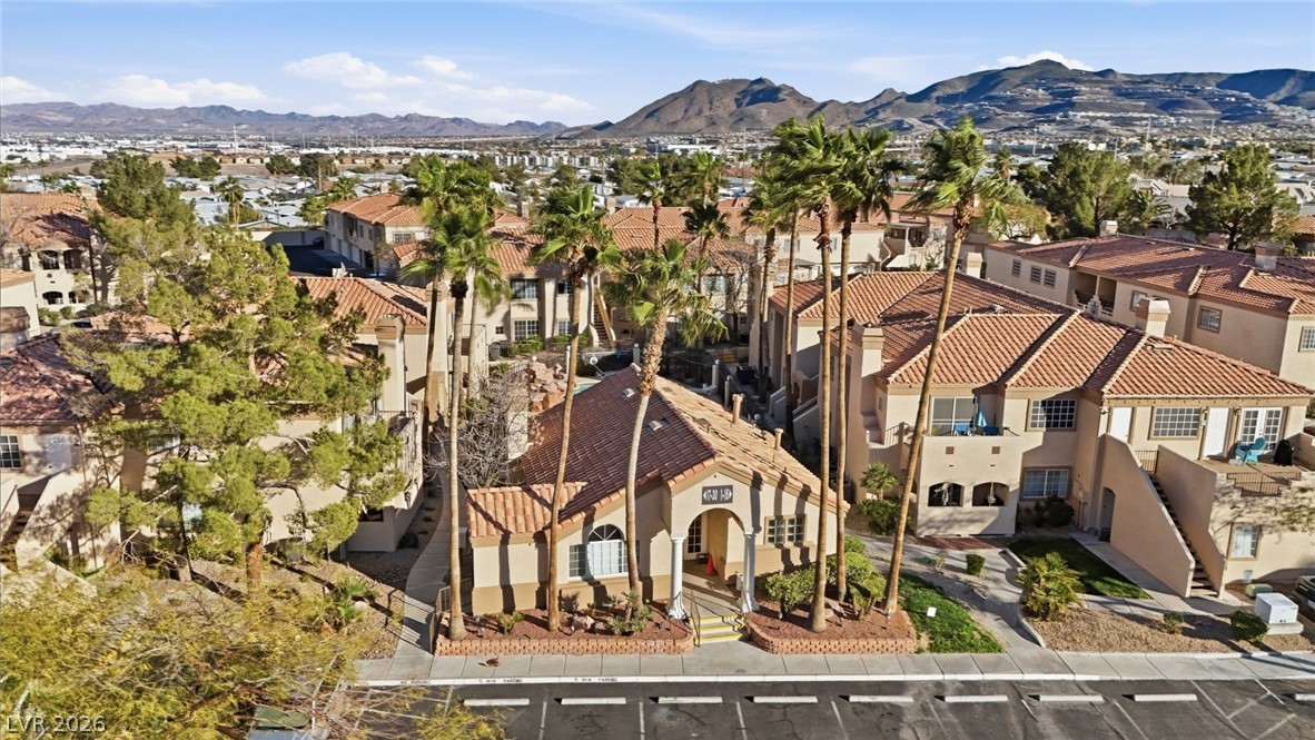 1851 Hillpointe Road, Unit 1311 Henderson, NV 89074 - Photo 46 of 47 Aerial perspective of suburban area with a mountain backdrop