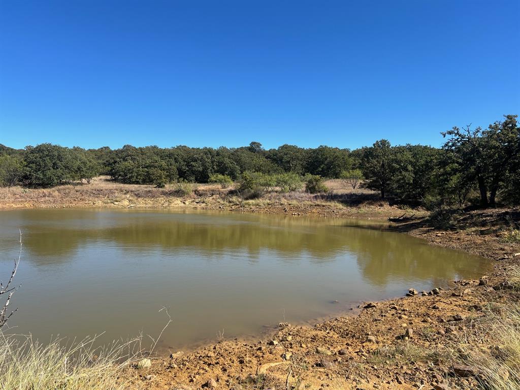Tbd Uselton Road Loving, TX 76460 - Photo 15 of 26 a view of a lake with a mountain