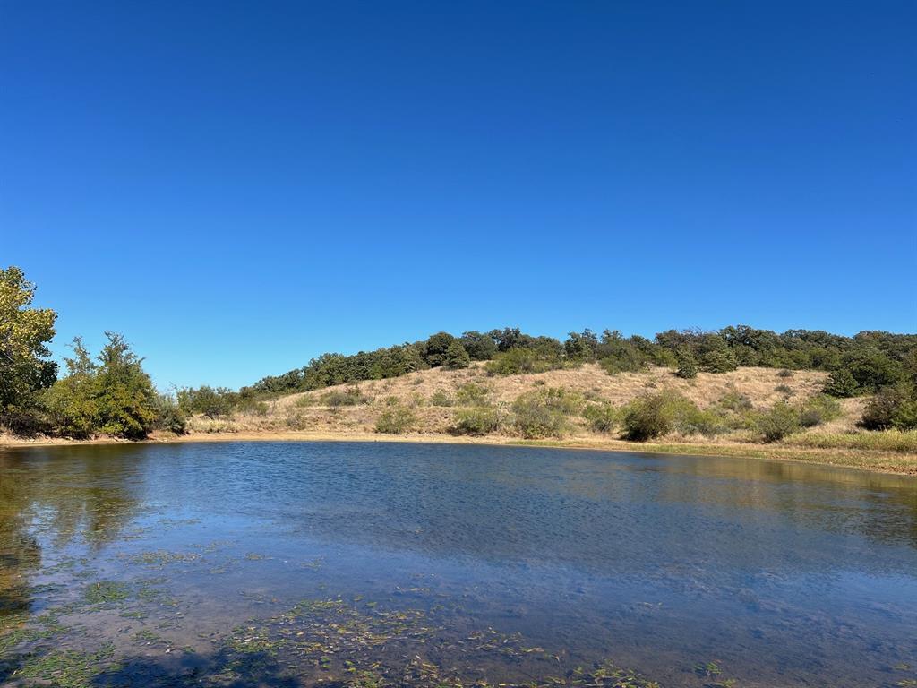 Tbd Uselton Road Loving, TX 76460 - Photo 6 of 26 a view of lake with mountain in the background