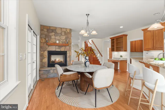 a bathroom with a glass shower door and a mirror