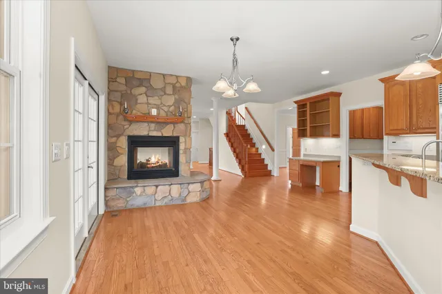 a white bath tub sitting in a bathroom next to a window