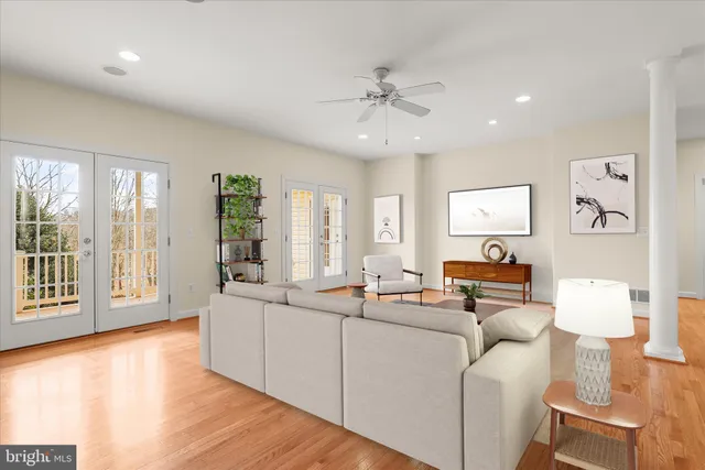 a spacious bedroom with a bed and a couch