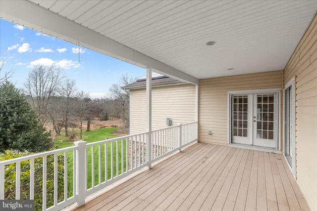 a bathroom with a bathtub and window
