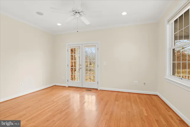 a view of kitchen with granite countertop a stove top oven a sink a counter space and a window