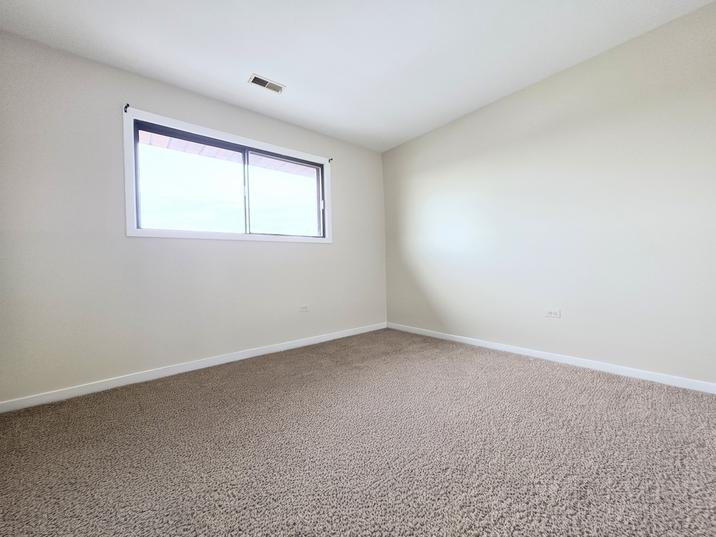 4818 West 122nd Street, Unit 3W Alsip, IL 60803 - Photo 12 of 21 an empty room with a window