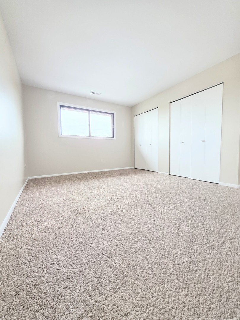 4818 West 122nd Street, Unit 3W Alsip, IL 60803 - Photo 13 of 21 wooden floor in a room