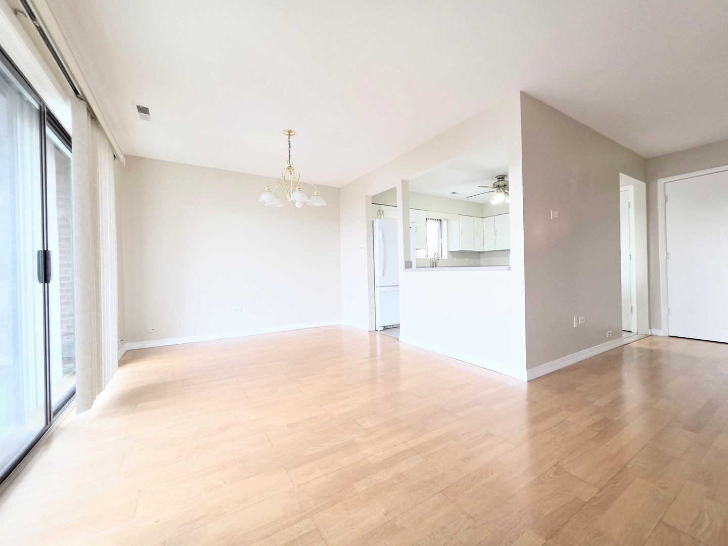 4818 West 122nd Street, Unit 3W Alsip, IL 60803 - Photo 3 of 21 a view of an empty room with a window