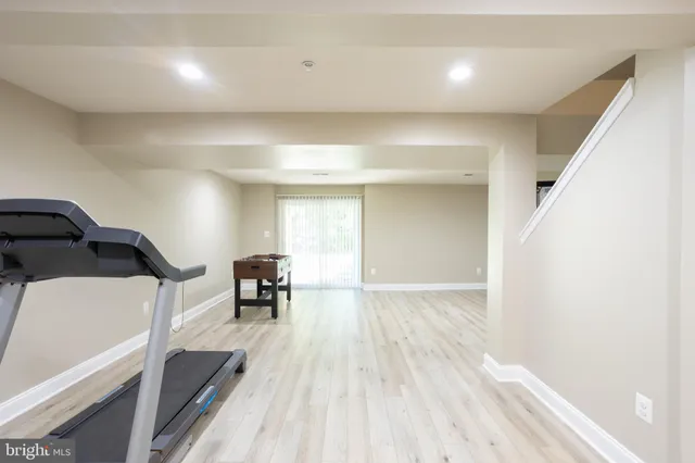 a view of dining room with furniture and wooden floor