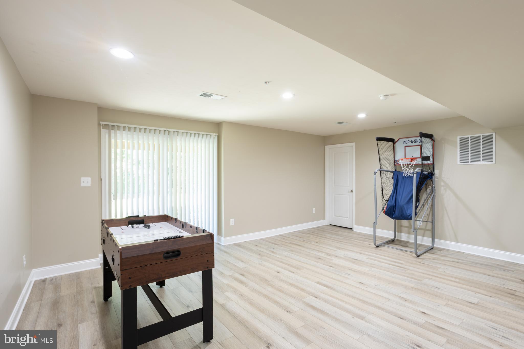 153 Cool Springs Road North East, MD 21901 - Photo 14 of 47 a view of room with wooden floor and gym equipment